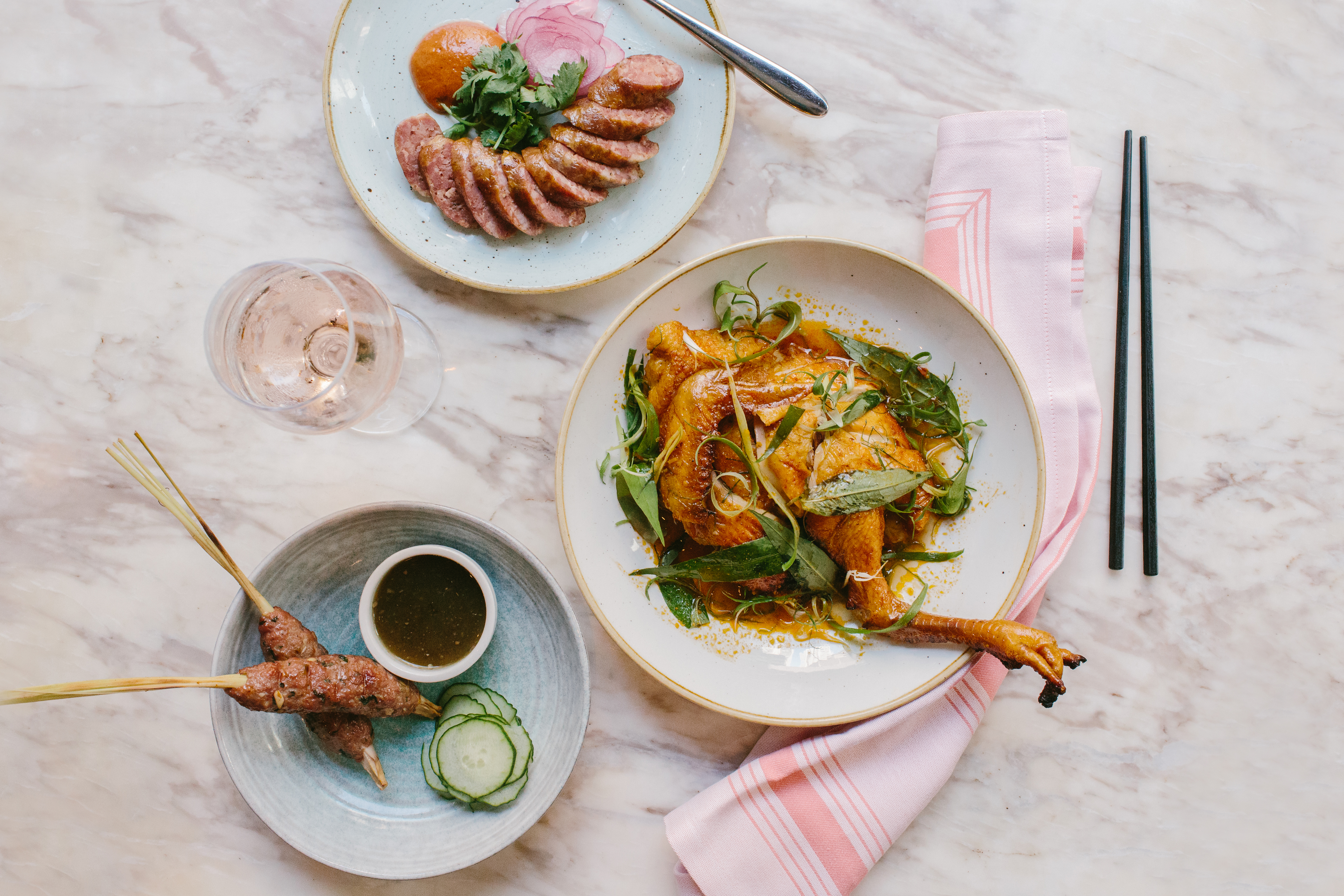 A 'Sai Oua' pork suasage, the 333 beer can chicken, and lemongrass lamb skewers